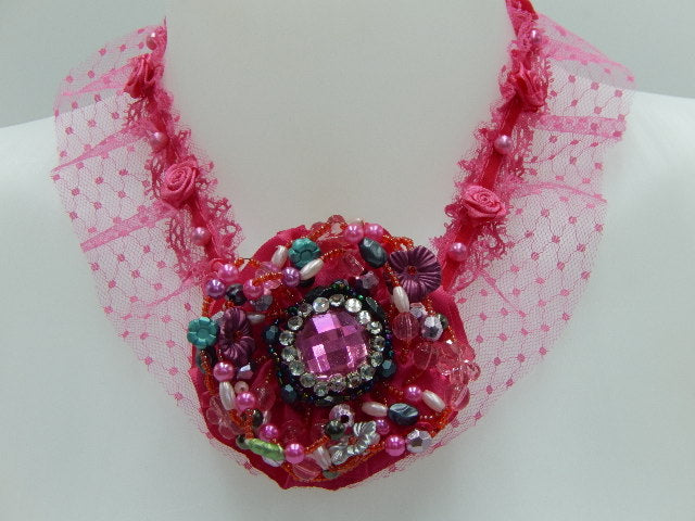 Collier médaillon fuchsia