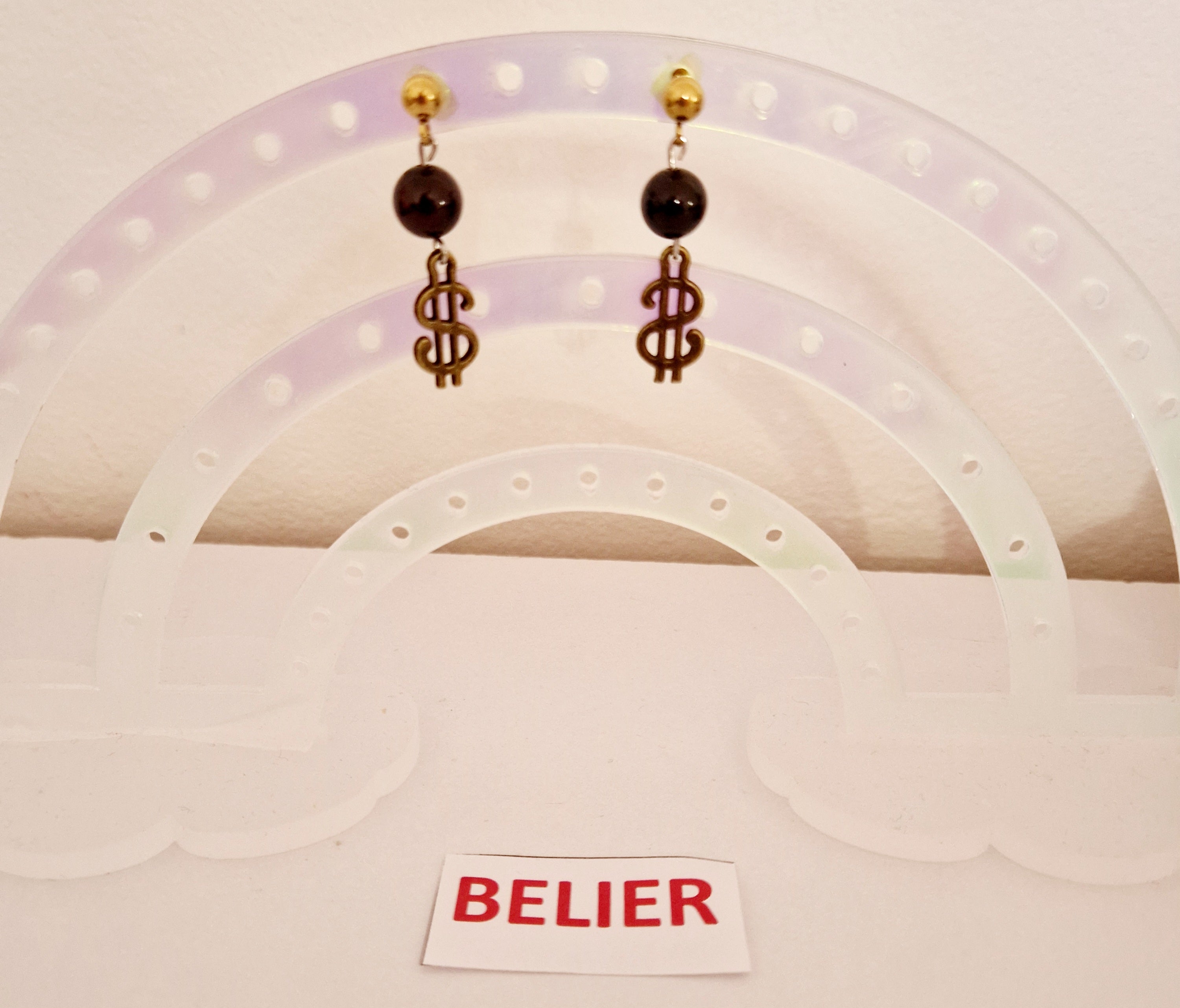 Boucles d'oreilles Bélier avec Dollars