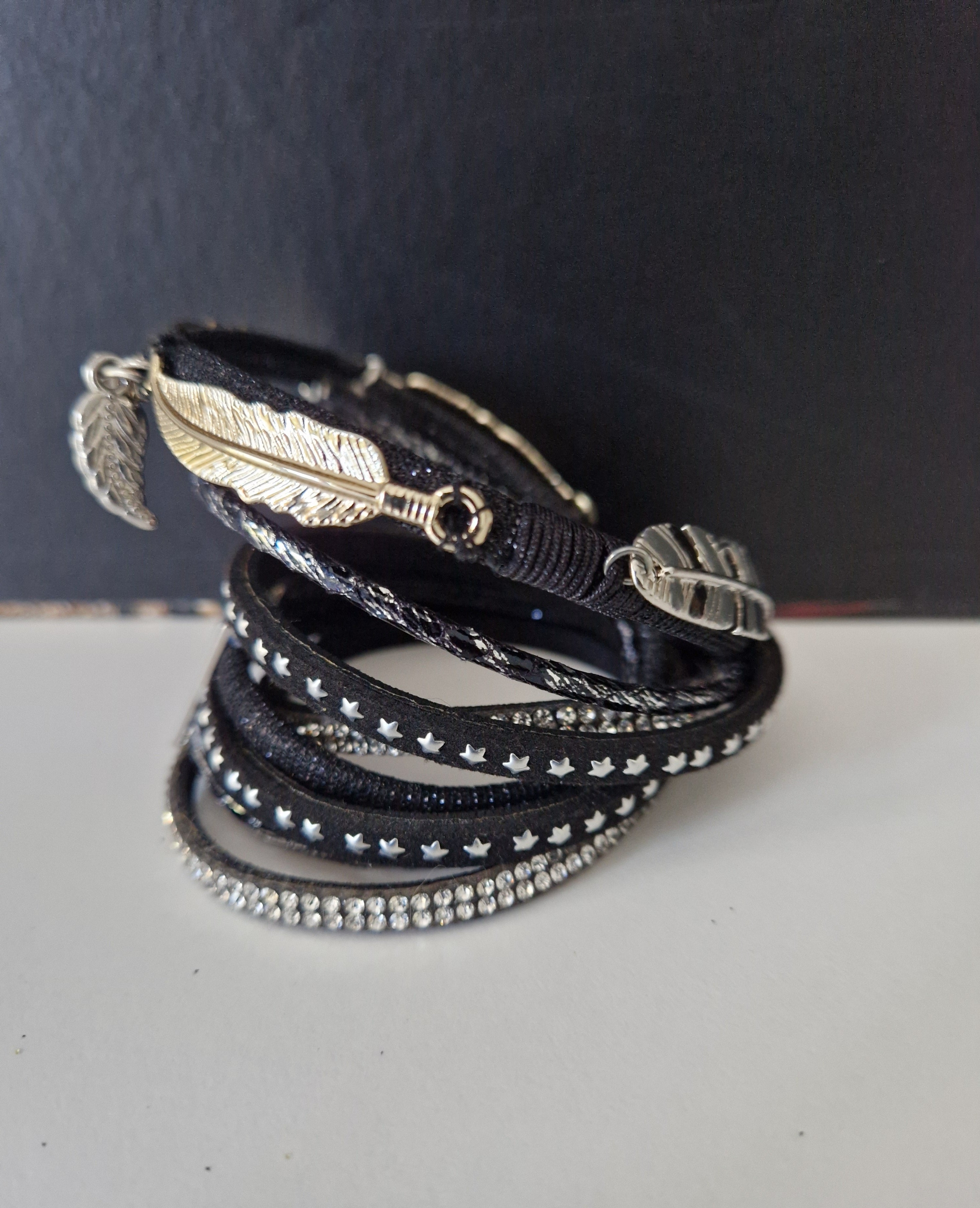 Bracelet multi rangs plumes