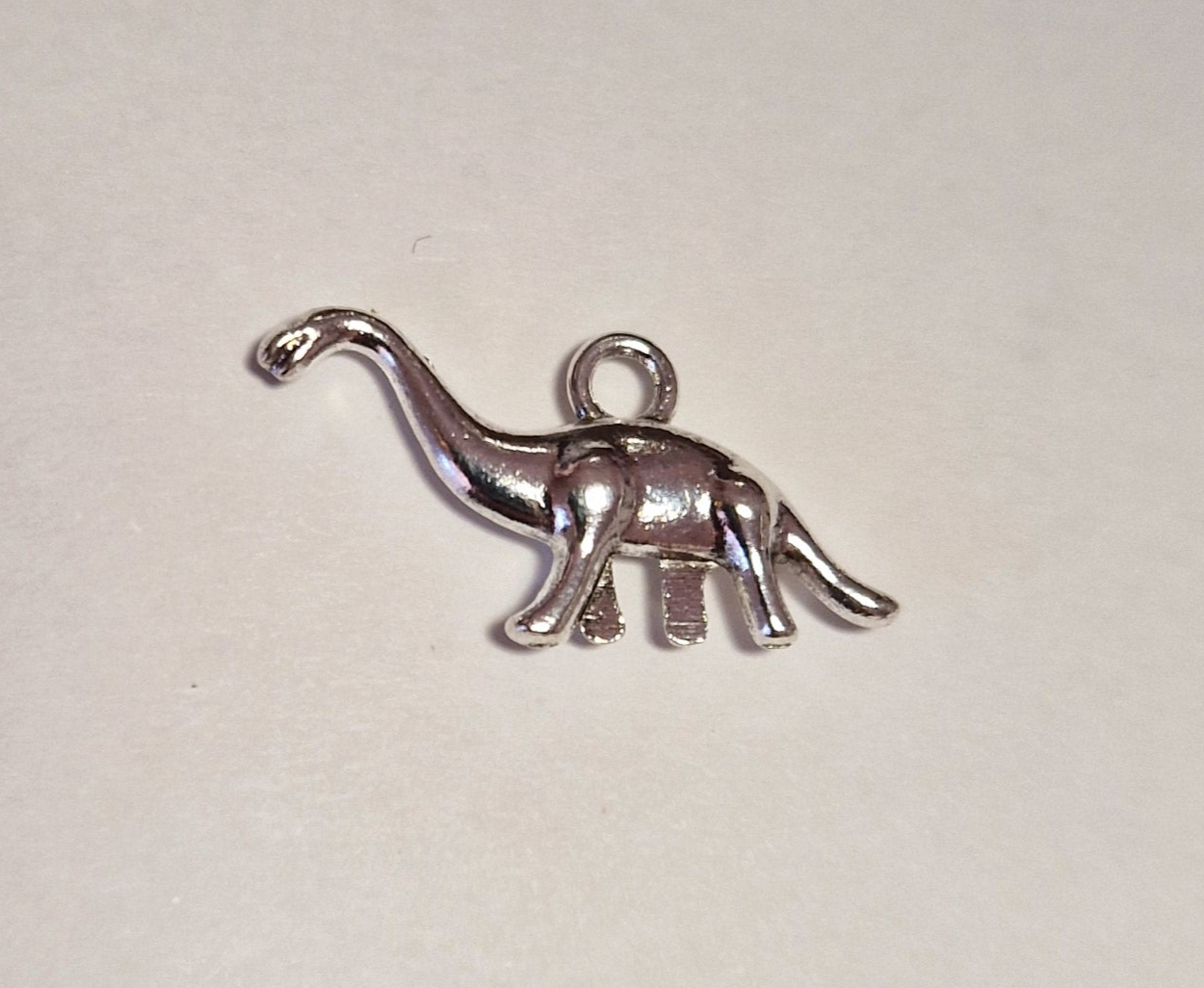 CHARM Dinosaure