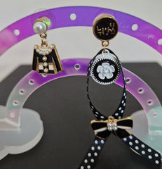 Boucles d'oreilles dépareillées