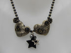 Collier cœur gris