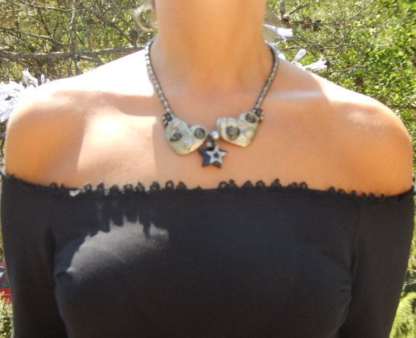 Collier cœur gris