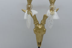 Attrape rêve et pompons blancs